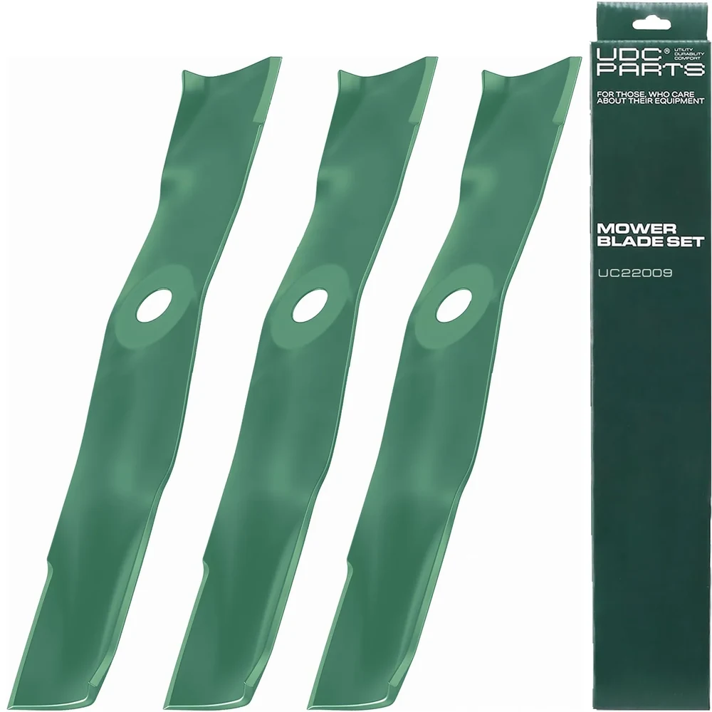 Three green mower blades beside product packaging